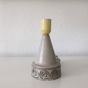 Beautiful and elegant table lamp from Abbednæs pottery in a muted color .