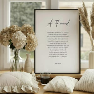 a framed poem titled "Marriage" by Susan Rine, which is a black and white photograph of a framed poem.