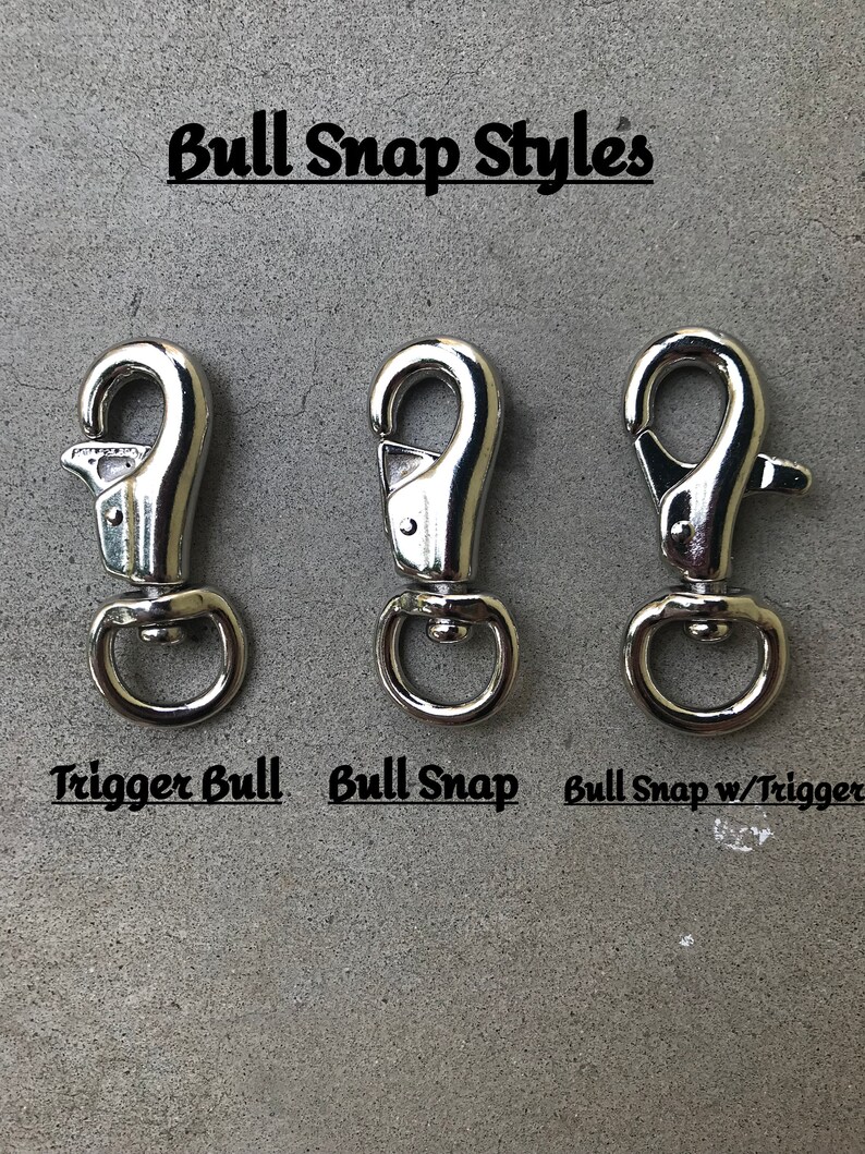 May include: Three silver bull snap styles: trigger bull snap, bull snap, and bull snap with trigger.  Bull Snap Styles.