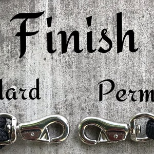 May include: Two black rope dog leads with silver clips. The leads are labelled "Standard" and "Permanent" to show the different types of finishes available.