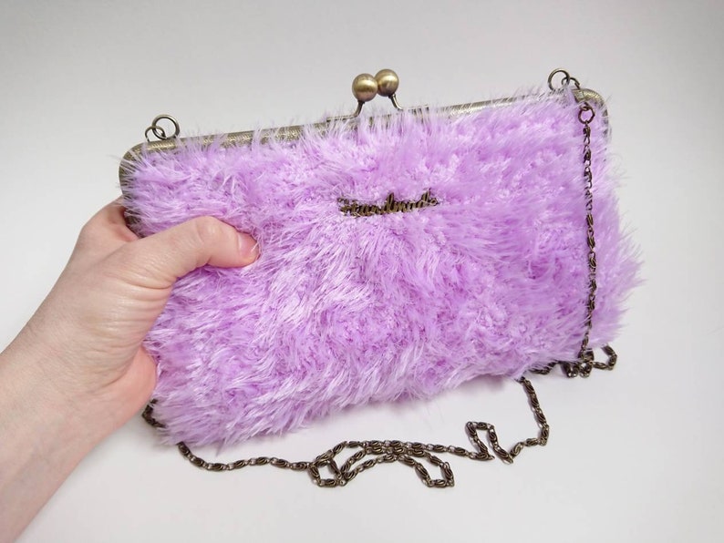 light purple clutch bag