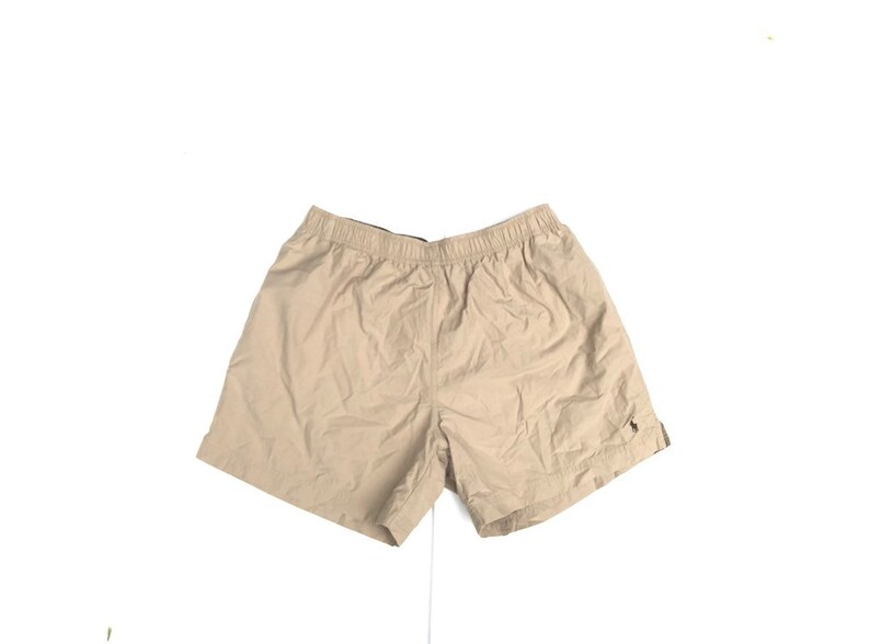 tan swim trunks