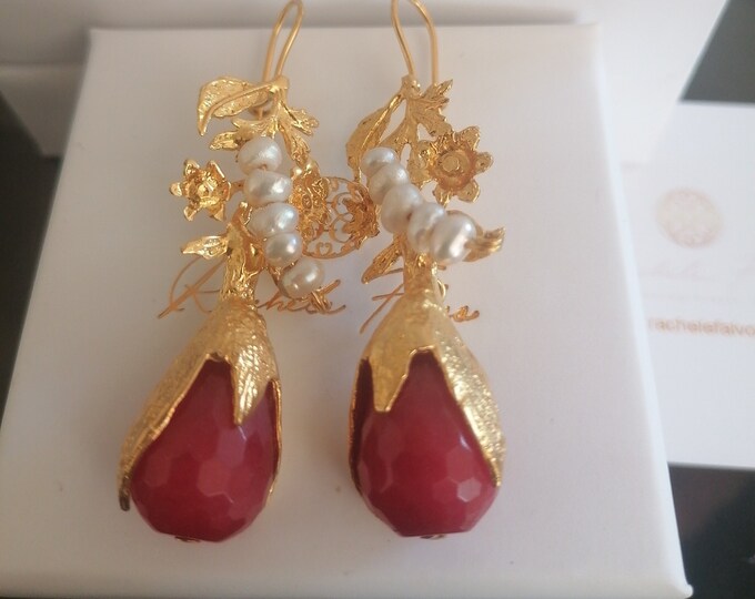 Matte gold earrings on bronze and finished with pearls and natural red jaspers.