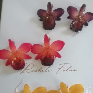 pairs of natural orchid earrings incorporated in resin with silver hooks
