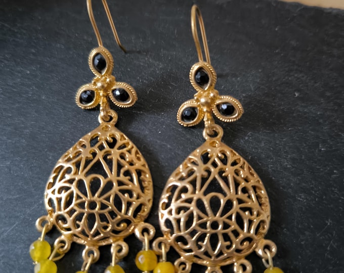 Gold filigree earrings with natural black onyx and yellow jasper stones.