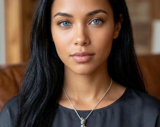 silver pendant and sea creatures