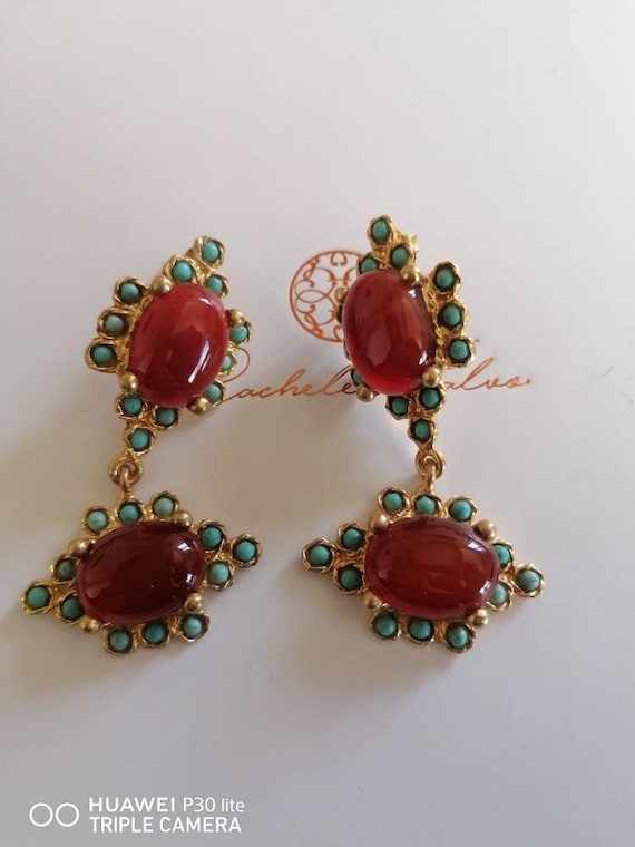 Pair of earrings in matt gold on bronze and finished with natural cabochon cut carnelians and turquoises