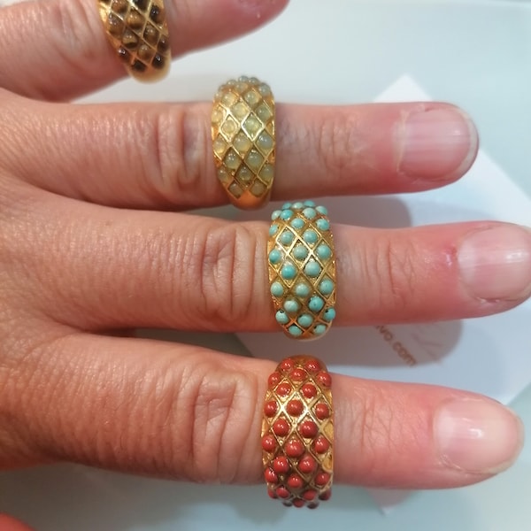 Etruscan gold rings on bronze and natural stones