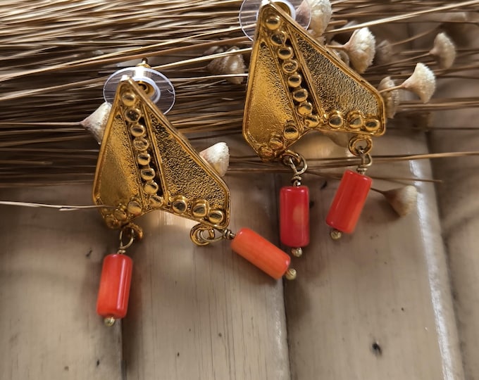 Very elegant gold on bronze earrings in the style of an ancient Etruscan shield and finished with pink corals.