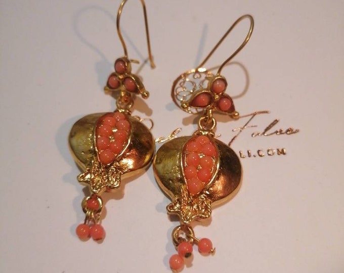 Pomegranate earrings crafted from matte gold on bronze and finished with natural pink corals.