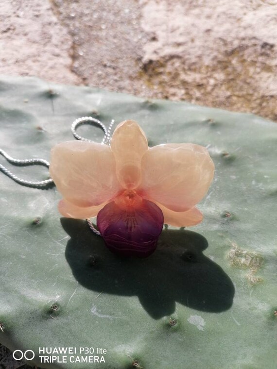 White Orchid latch necklace incorporated in resin and finished with adjustable galvanized silver latch