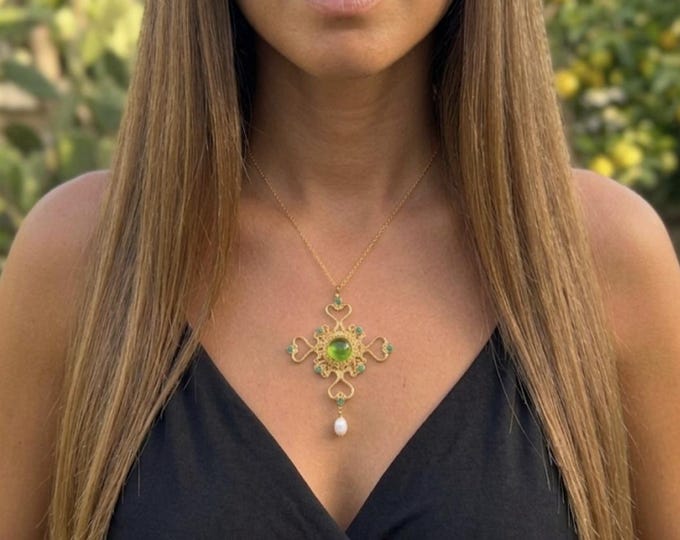 Necklace with Christian Cross in gold on bronze is finished with natural green peridot Pearl and turquoise