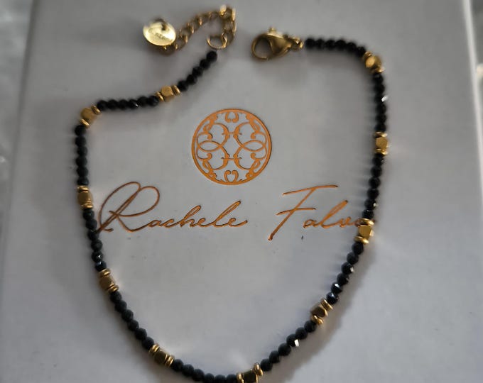 Unisex bracelet in gold-plated steel and black obsidians