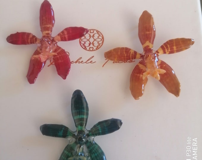 Cambria orchid pendant, pendant only, encased in resin.