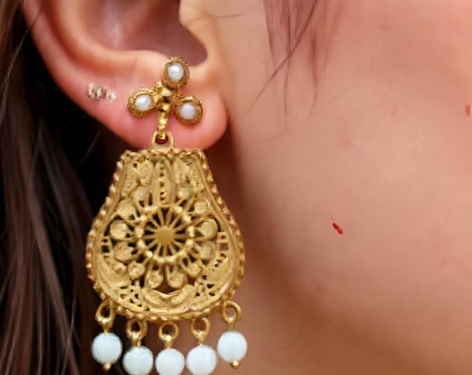 gold filigree earrings with natural faceted blue topazes