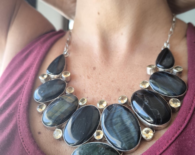 Silver necklace with labradorites and topazes