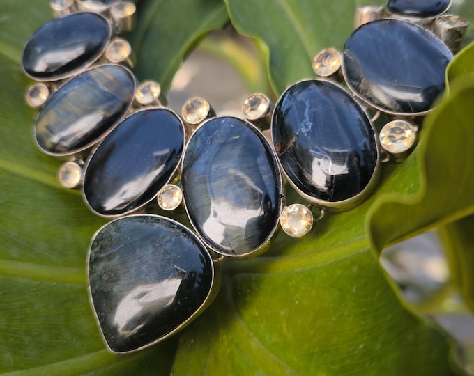 Silver necklace with labradorites and topazes