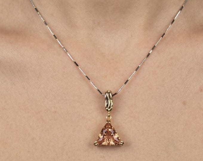 Trillion pendant complete with burnished silver chain, gold-plated embroidery and central zultanite - the sultan's stone -
