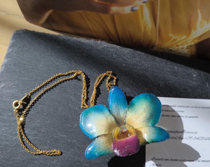 Necklace with dendrobium orchid flower embedded in resin