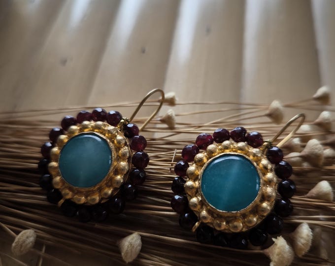 Antique-style gold earrings with a mix of natural stones