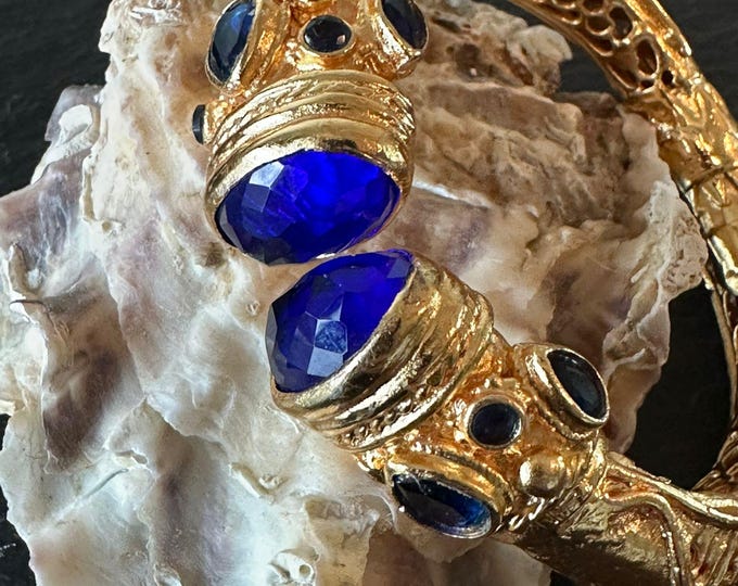 Antique style gold bracelet with blue topazes