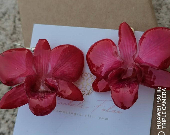 Pair of natural orchid earrings embedded in resin with silver hooks