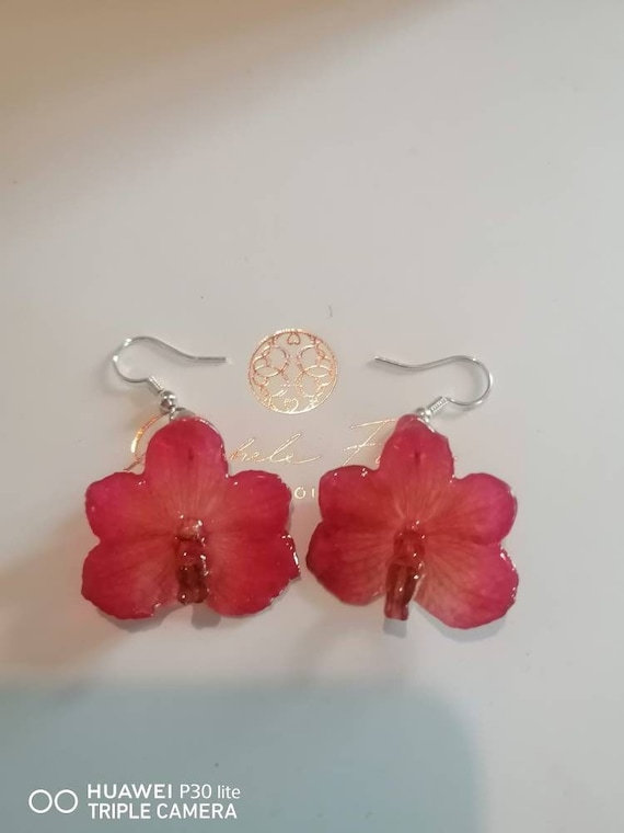 Mini orchid pendant earrings incorporated in resin with silver hooks