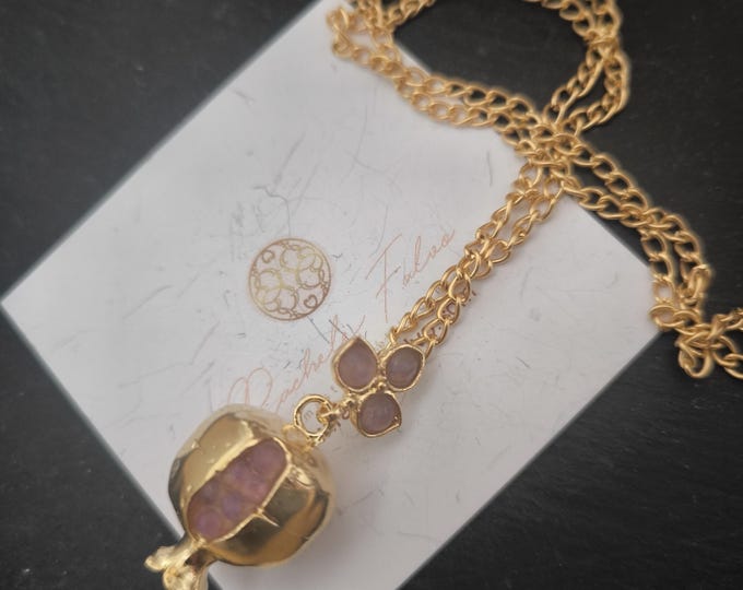 Pomegranate pendant in gold on bronze and finished with natural light lilac amethysts. Handmade jewelry.