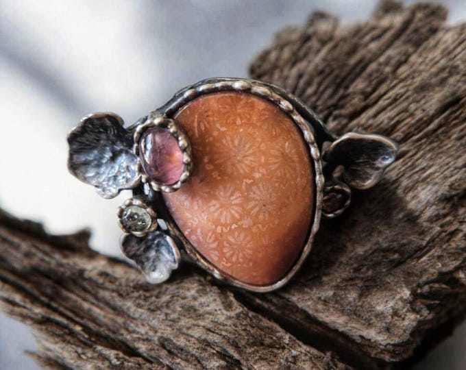 Adjustable silver ring with fossil coral, amber and pink tourmaline.