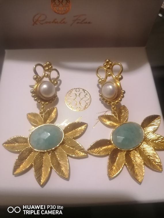 Leaf earrings in matte gold on bronze and finished with pearls and faceted topaz