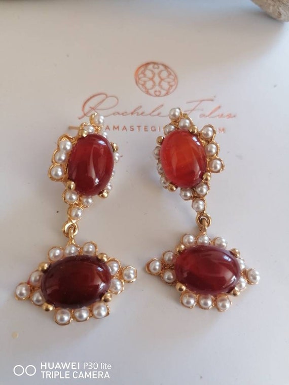 Pair of matt gold on bronze pendant earrings, worked with natural carnelian and pearls