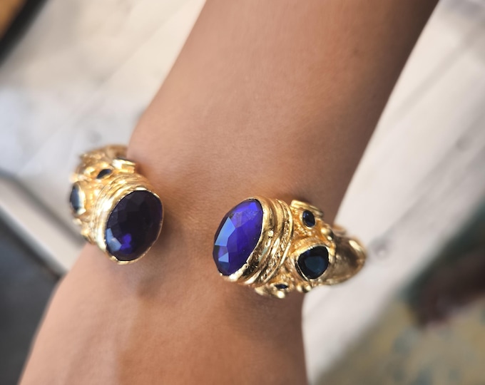Antique style gold bracelet with blue topazes