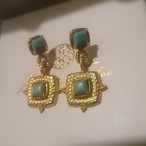 Etruscan style earrings in matt gold on bronze and finished with natural turquoises