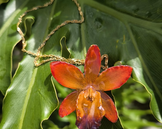 resin orchid pendant and gold or silver steel chain