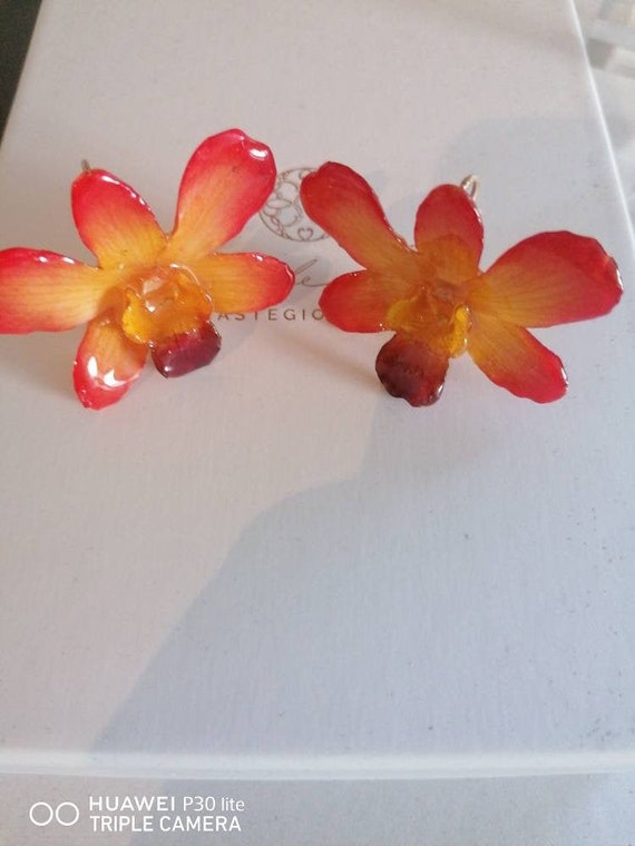 Orange yellow orchid earrings incorporated in resin with silver hook