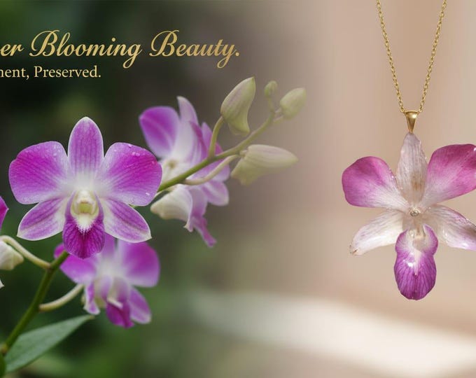 Singapore orchid necklace embedded in resin and gold-plated silver chain.