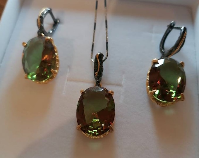 Burnished silver earrings and pendant set with gold embroidery. Multicolor iridescent Diaspore