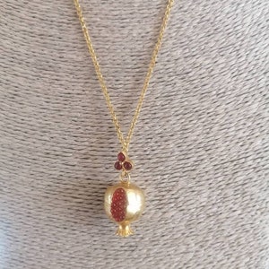 Pomegranate pendant in matt gold on bronze and red pomegranates