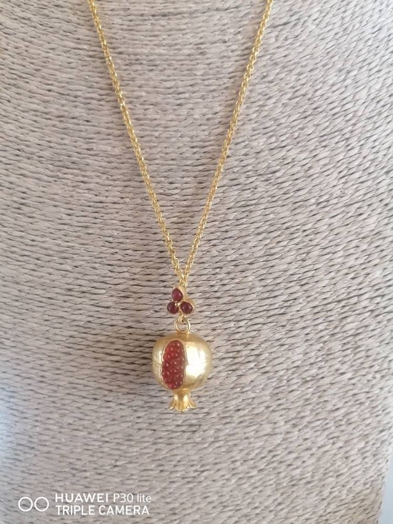 Pomegranate pendant in matt gold on bronze and red pomegranates