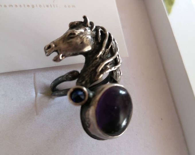 Adjustable silver ring depicting a horse with natural amethyst and blue sodalite