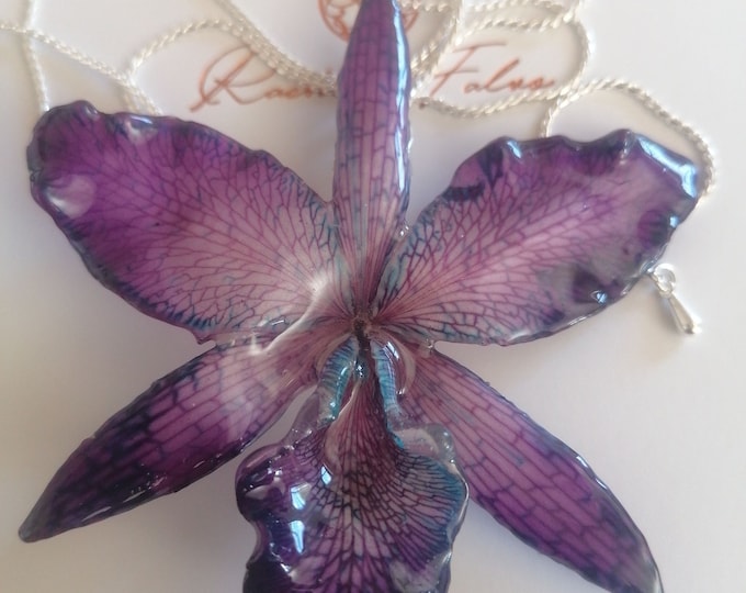 Adjustable shower rail in galvanized silver and purple Cattlaya orchid with blue reflections embedded in resin