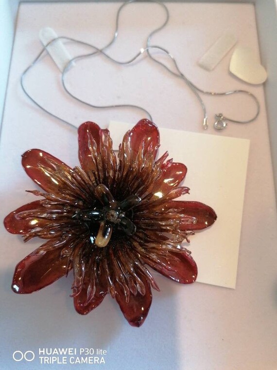 Beautiful natural passion flower brooch/necklace embedded in resin with silver chain