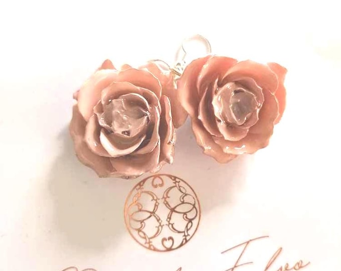 Earrings with natural roses embedded in resin