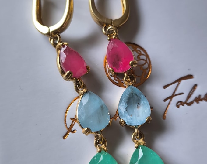 925% silver and gold-plated earrings crafted and finished with high-quality natural rubies, emeralds, and aquamarines.