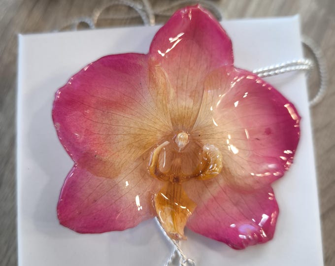 Adjustable silver orchid necklace with a drop