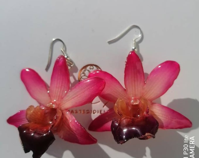 Natural orchid earrings embedded in resin