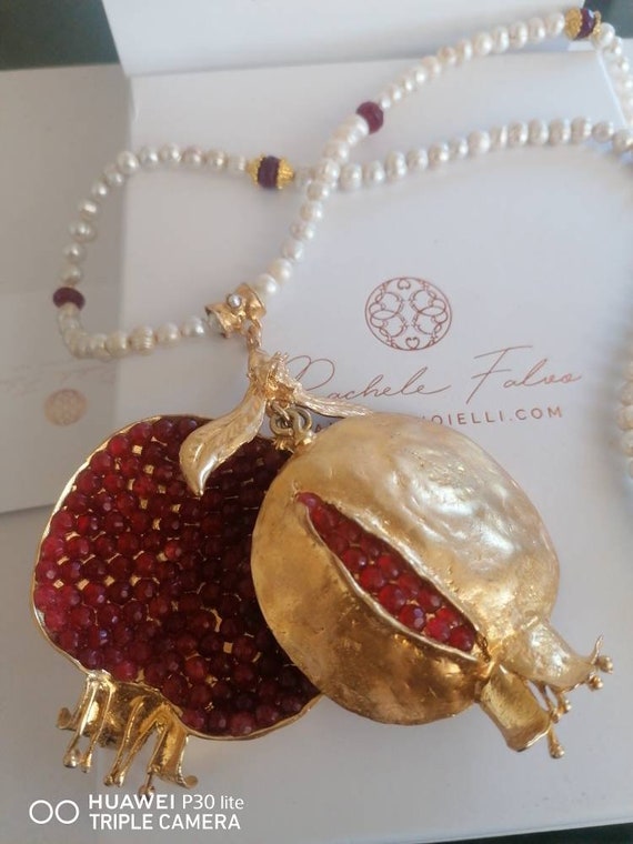 Spectacular pomegranate necklace in matt gold on bronze with red garnets and pearls