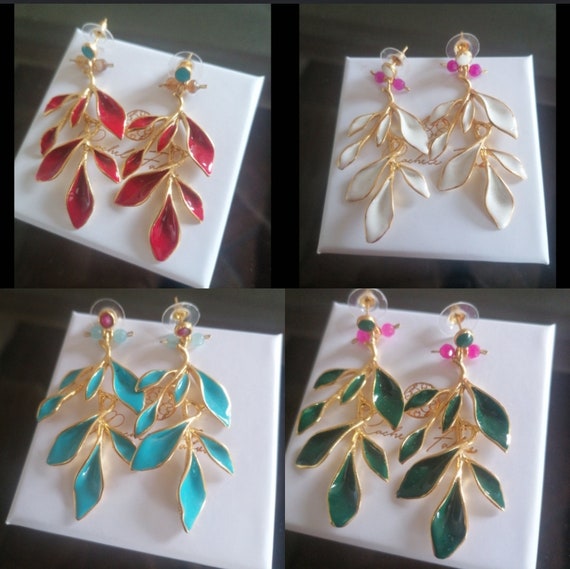 Earrings, in gold, on, bronze leaves and finished with hot goldsmith's enamel