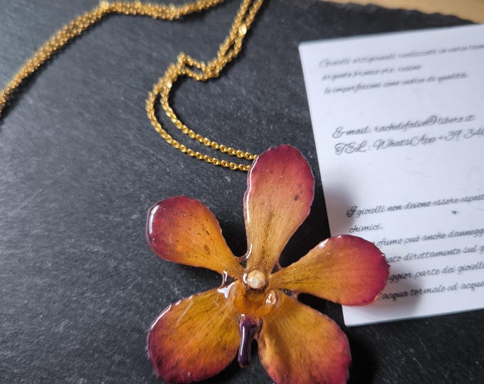 Orange Brown Vanda orchid necklace embedded in resin with nickel-free galvanic gold chain.