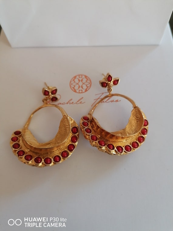 Earrings in matte gold over bronze and finished with natural red corals